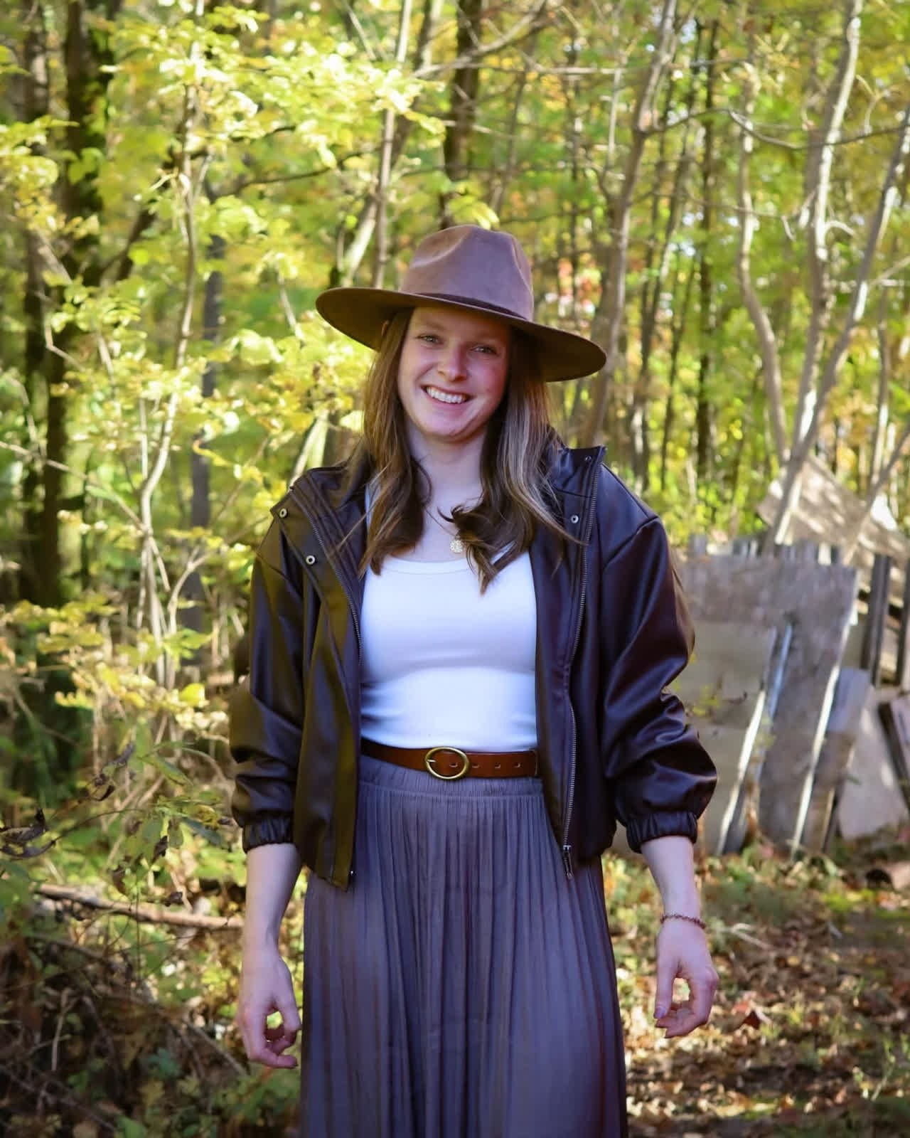 Portrait of the LessDo founder, smiling, outdoors